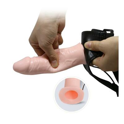 Arnés con dildo hueco y vibración 5